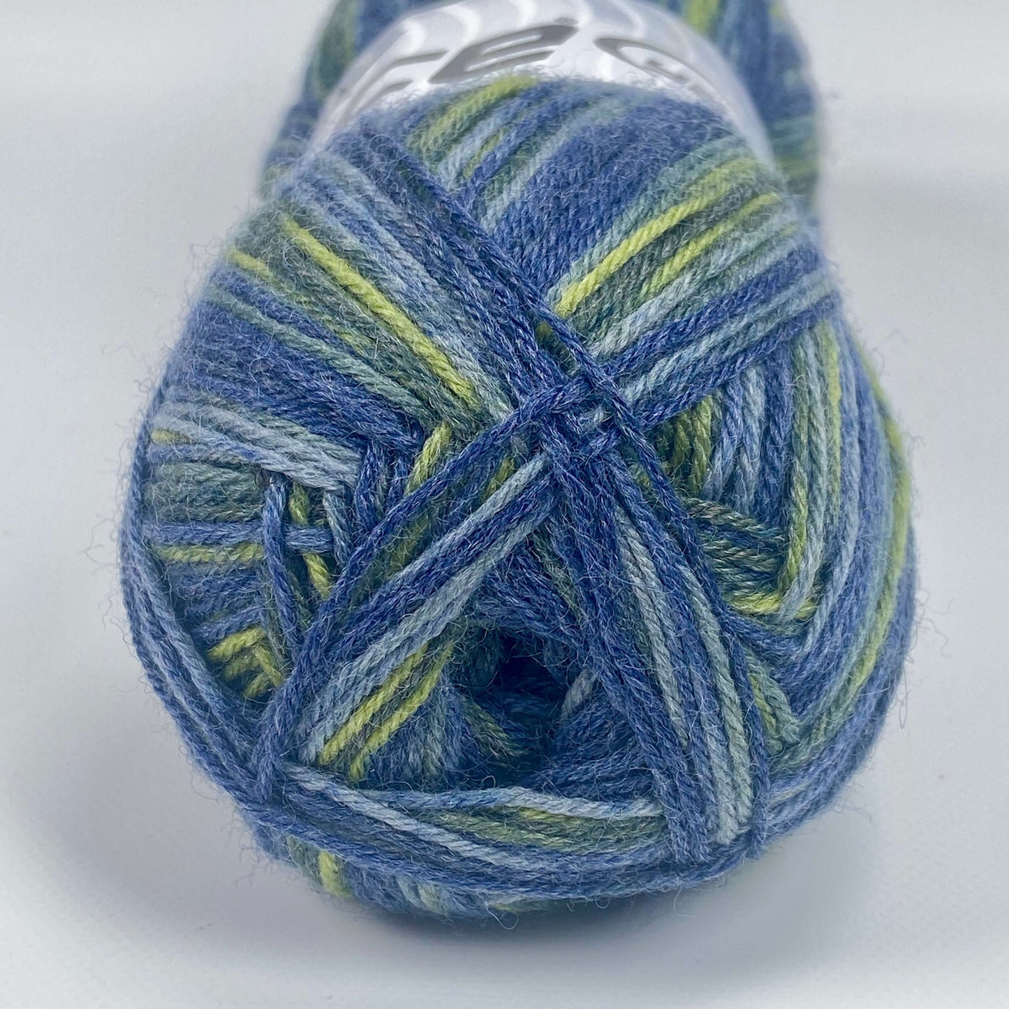 ball of sock yarn by Ice Yarns in blue and green shades - The Sock Knittery