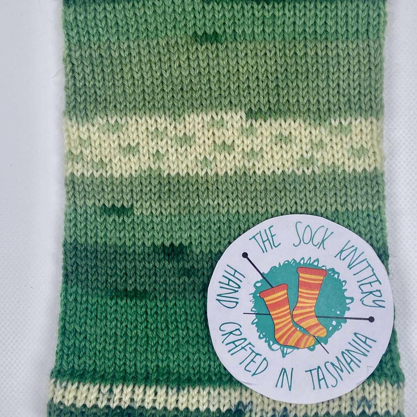 example knitted sock yarn in green shades - The Sock Knittery
