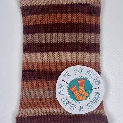 sample of striped sock yarn in brown shades - The Sock Knittery